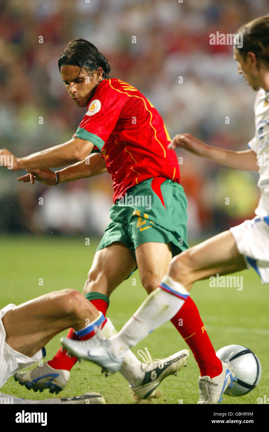 Soccer - UEFA European Championship 2004 - Group A - Russia v Portugal. Portugal's Nuno Gomes battles for the ball Stock Photo