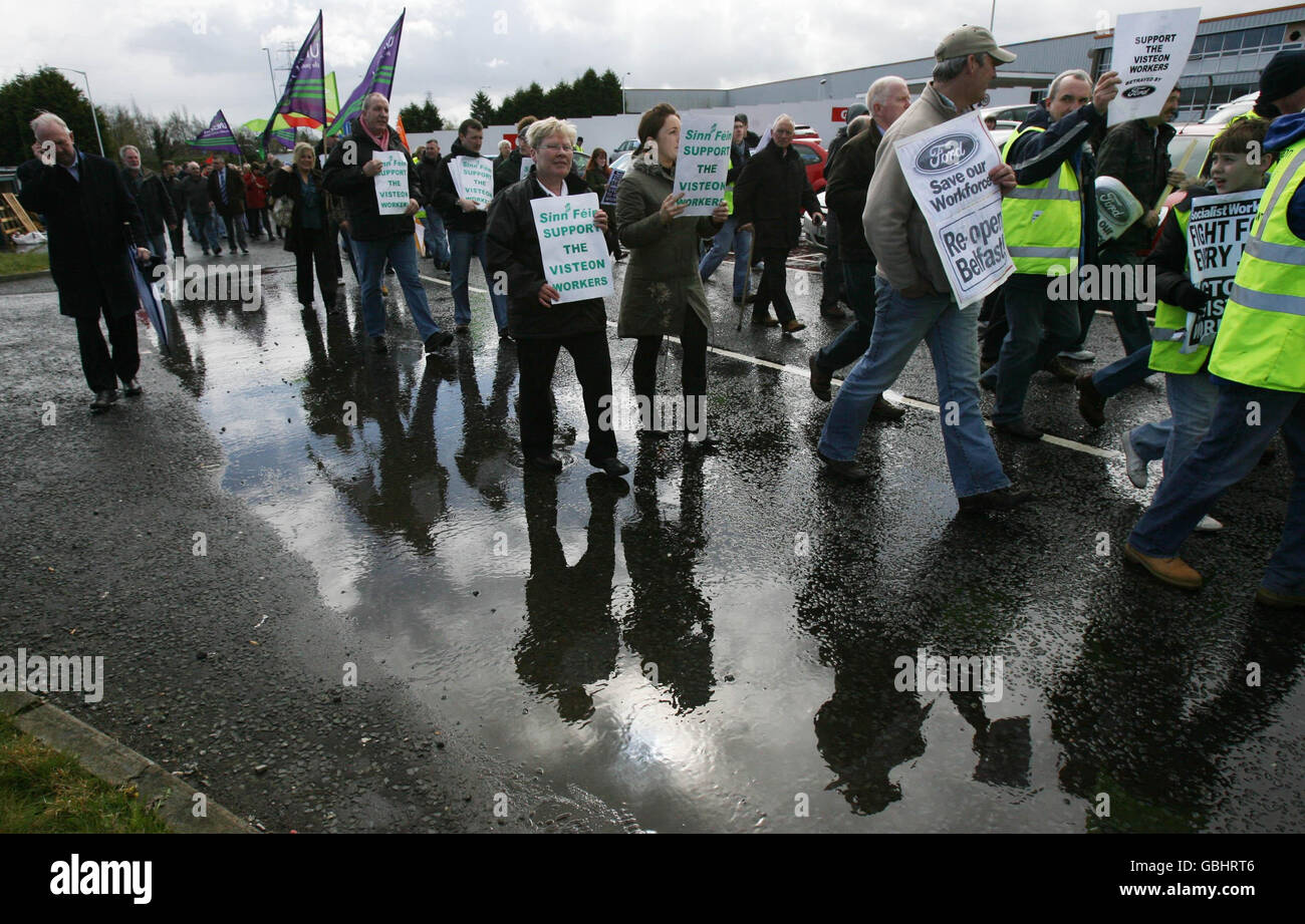 Redundant Visteon workers protest outside the Belfast plant. Politicians, trade unionists, family members and supporters will parade from Andersonstown in west Belfast to the nearby Ford car components factory. Stock Photo