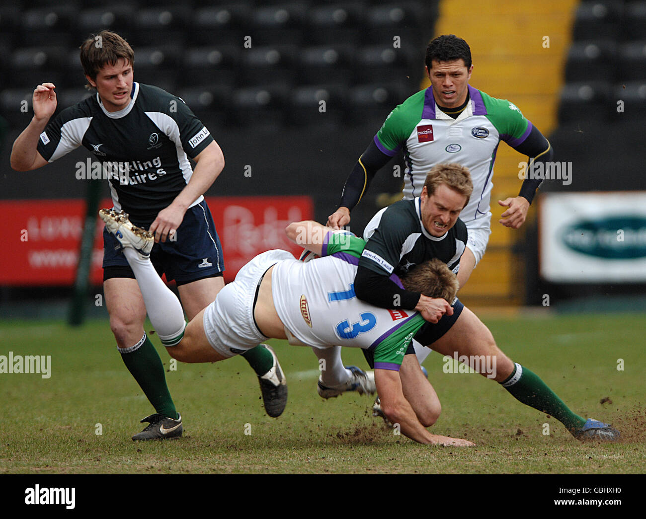 Nottingham's Timothy Taylor tackles Leeds Carnegie's Rob Vickerman (number 13) Stock Photo