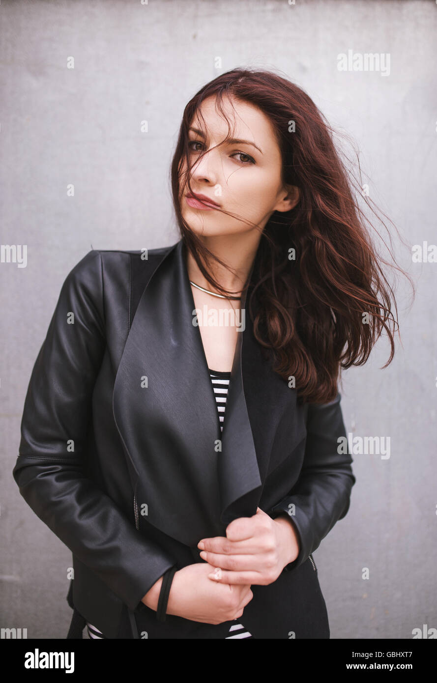 Portrait of a young woman in black leather jacket Stock Photo