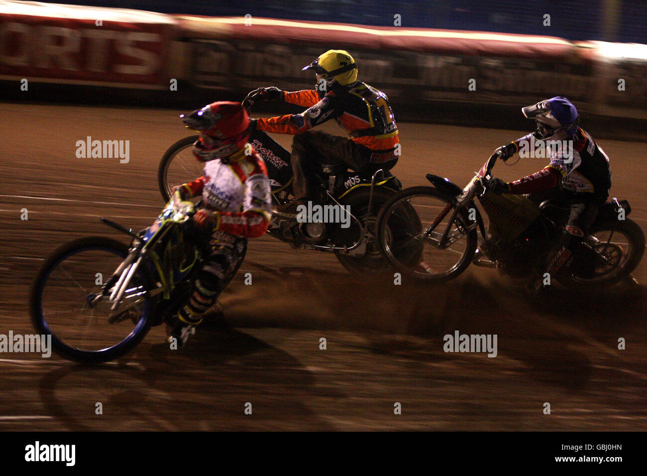 Swindon's Ryan Fisher (blue) and Wolverhampton's Chris Kerr (L) collide ...