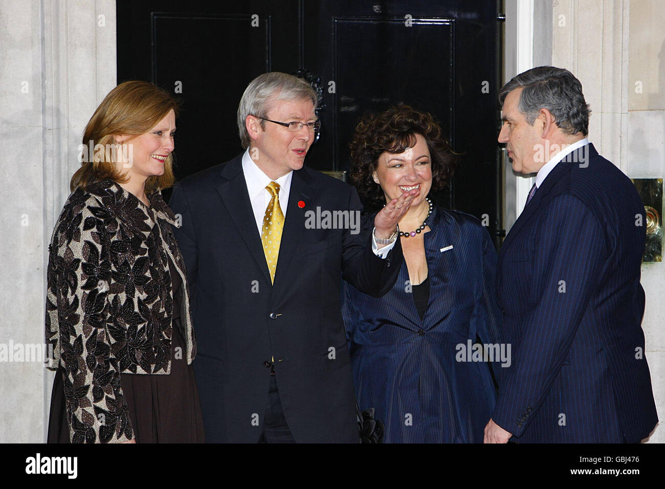 Australian Prime Minister Kevin Rudd and wife Therese Rein are greeted by Britain's Prime Minister Gordon Brown and wife Sarah as they arrive for a dinner hosted by British Prime Minister Gordon Brown at 10, Downing Street, of the eve of the G20 summit in London. Stock Photo