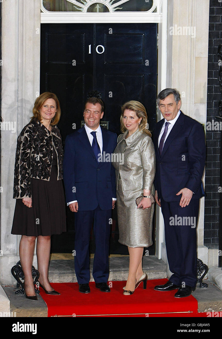 Dmitry A Medvedev, President of Russia and wife Svetlana Medvedeva arrive for a dinner hosted by British Prime Minister Gordon Brown at 10, Downing Street, of the eve of the G20 summit in London. Stock Photo