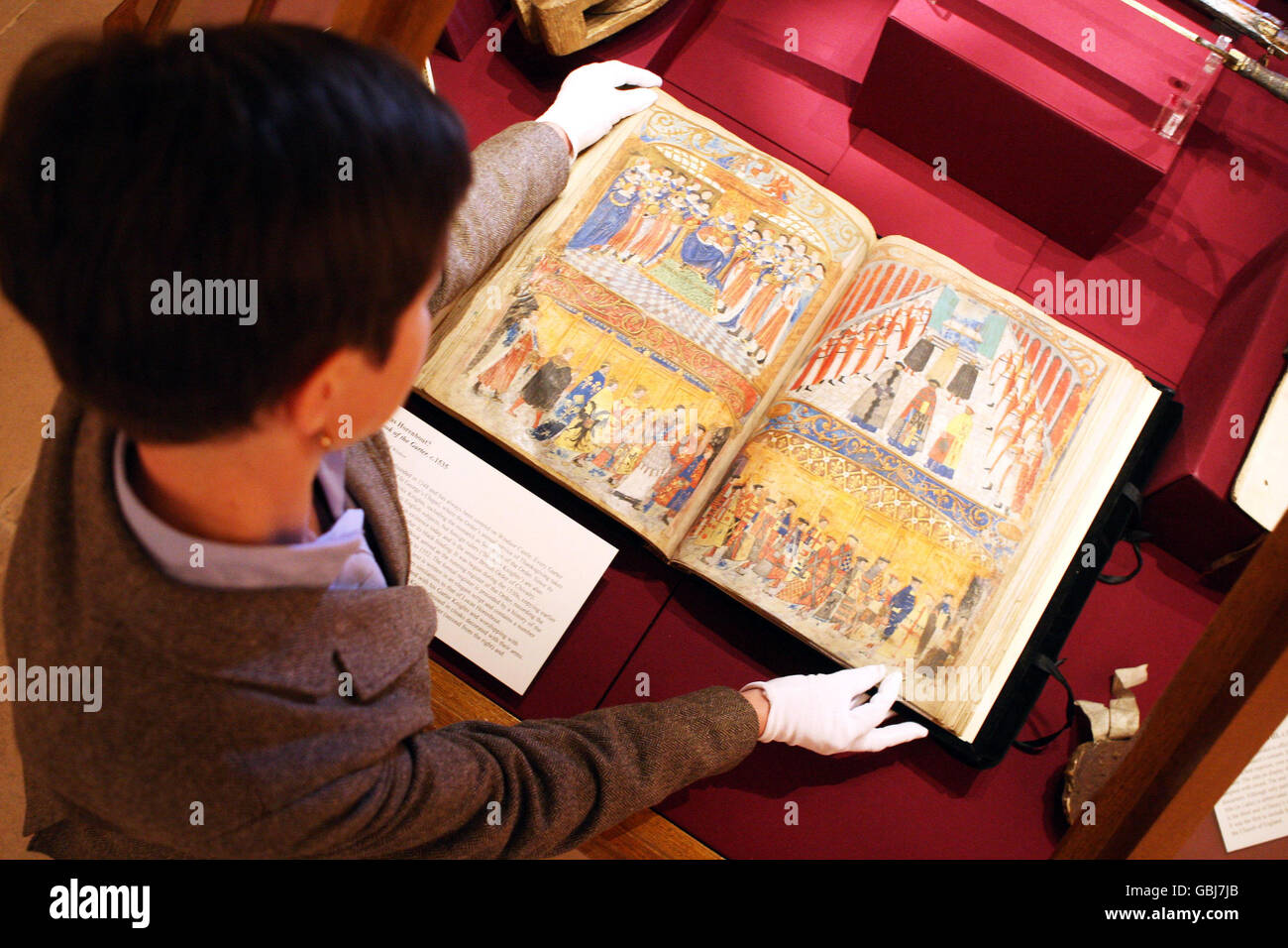 The Black book of the Garter, c1534 is carefully checked as the final preparations are put in place for the Henry VIII: A 500th Anniversary Exhibition, in the Drawings Gallery in Windsor Castle, Berkshire. Stock Photo