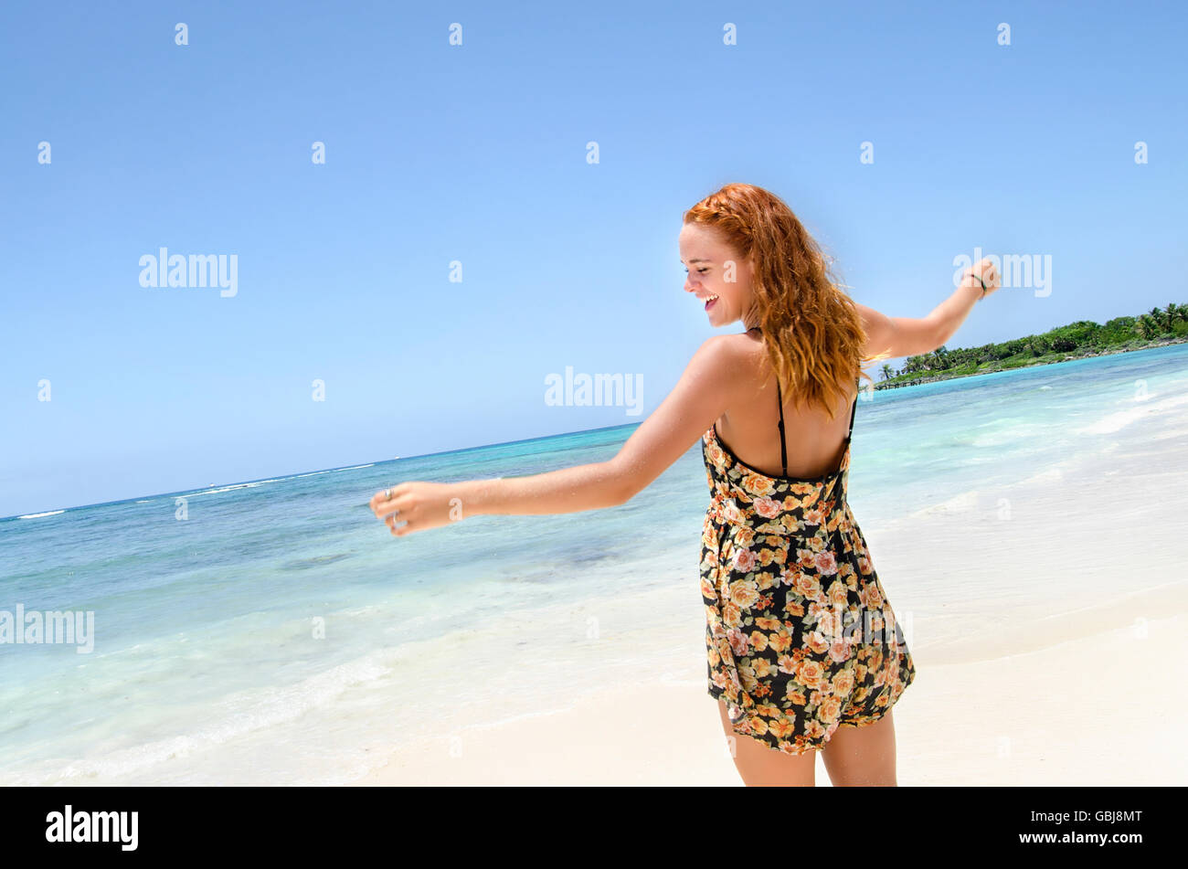 Happy Girl smiling at the beach Stock Photo - Alamy