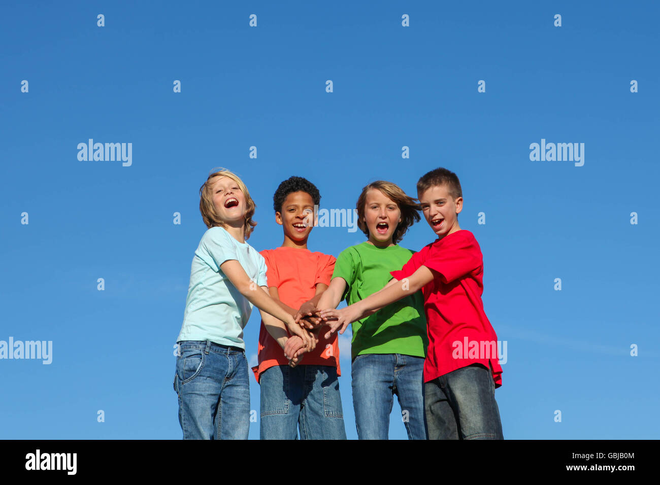 group of diverse kids or teens hands together Stock Photo - Alamy