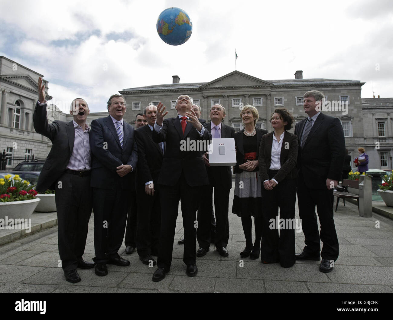 Environment Minister John Gormley (centre) joins members of the