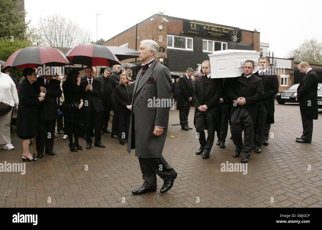 Funeral director Barry AlbinDyer walks ahead of Jade Goody's coffin as(02)
