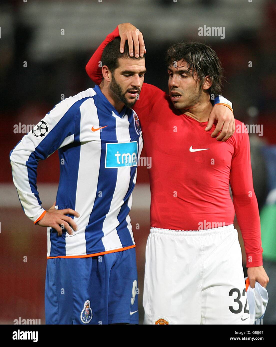 Soccer - UEFA Champions League - Quarter Final - First Leg - Manchester United v FC Porto - Old Trafford. FC Porto's Lisandro Lopez (left) and Manchester United's Carlos Tevez (rigth) after the final whistle. Stock Photo