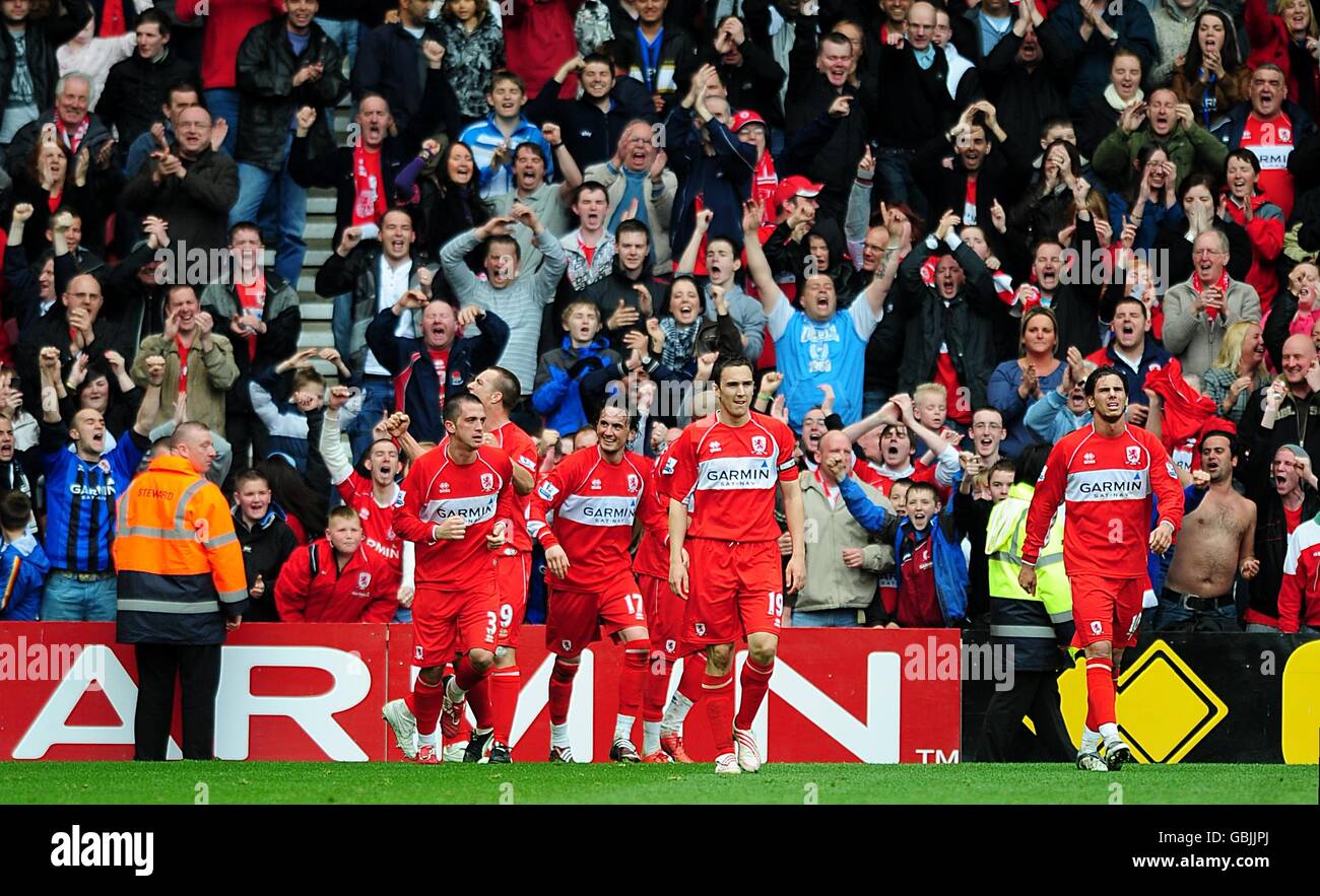 Middlesbrough players celebrate after team mate Marlon King (not