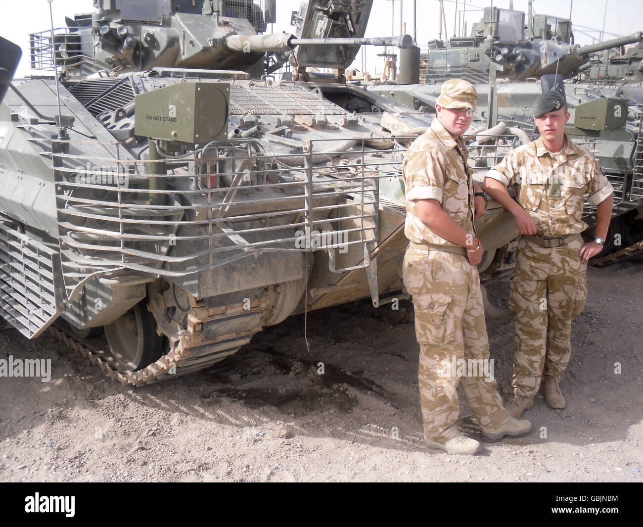 Undated photo of Rfn Nicholas Addey (left) and Rfn Sean Davies, of D-Company, 5 Rifles, on Contingency Operating Base Basra, in front of a Warrior Armoured Vehicle. Stock Photo
