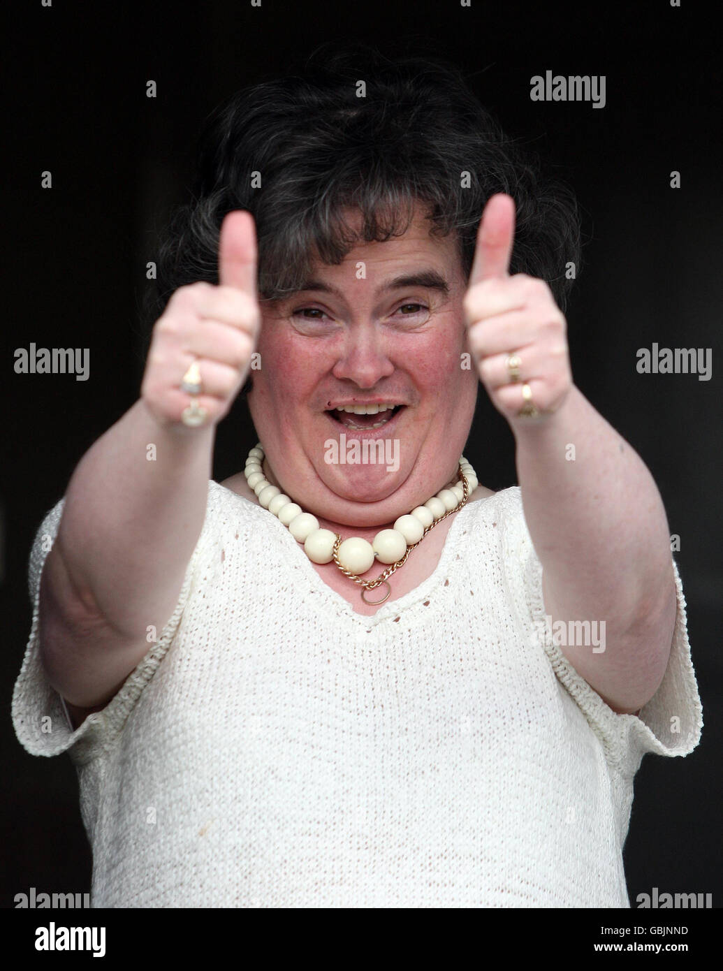 Britain's Got Talent star Susan Boyle at her front door in Blackburn, West Lothian. Stock Photo