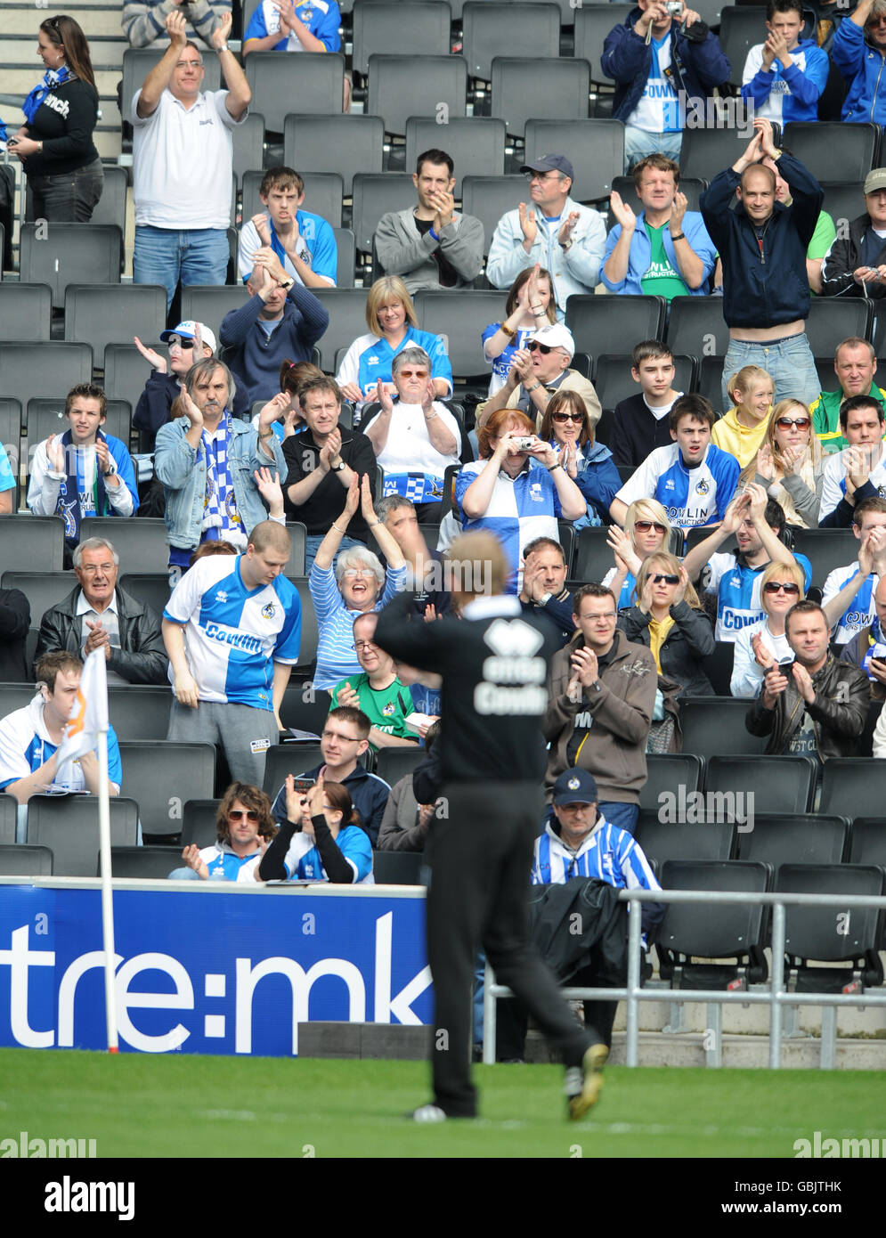 Bristol Rovers' manager Paul Trollope applauds the traveling fans Stock Photo