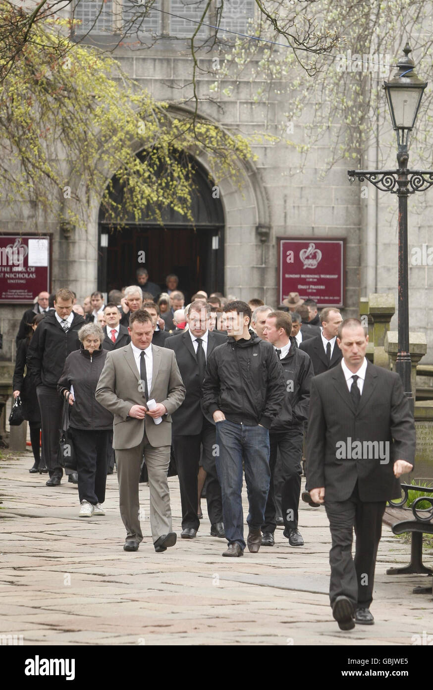 Mourners leave memorial service at Kirk of St Nicholas Uniting in memory of those killed in recent helicopter accident in North Sea. Stock Photo