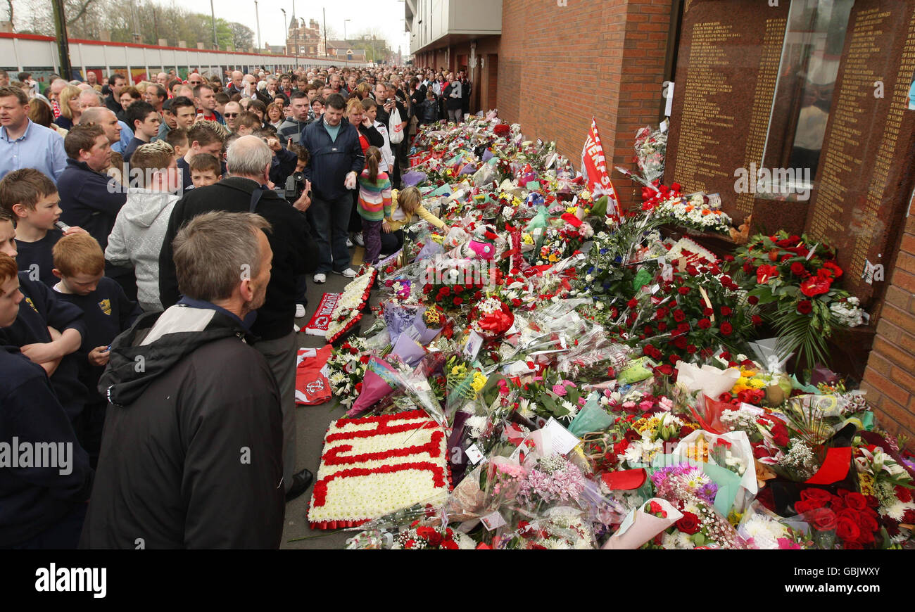Fans gather outside Anfield before the official memorial service at