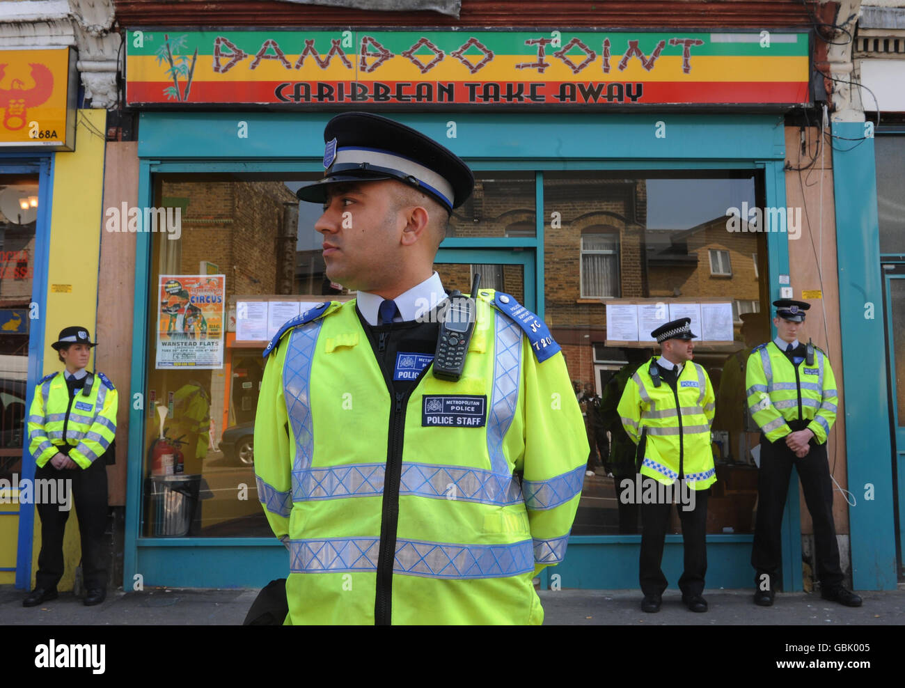Waltham Forest Council enforcement officers serve a closure order to fast food outlet Bamboo Joint in Leytonstone, east London, for setting up too close to a school. Stock Photo