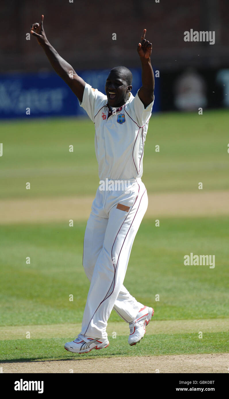 West Indies' Darren Sammy celebrates after taking the wicket of Leicestershire's Taylor during the Three Day Tour match at Grace Road, Leicester. Stock Photo