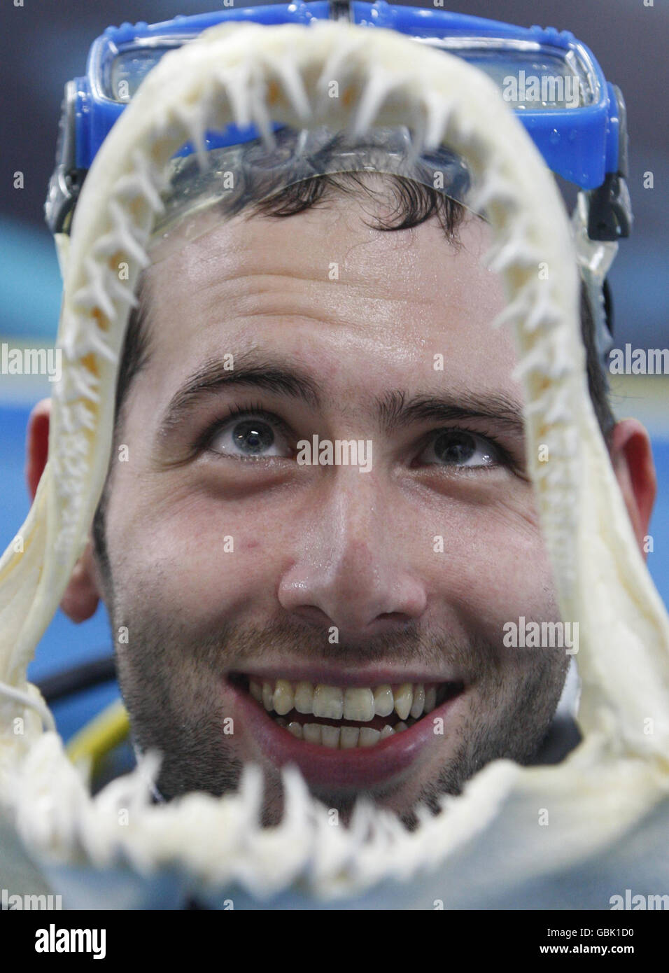 DJ Romeo swims with sharks Stock Photo