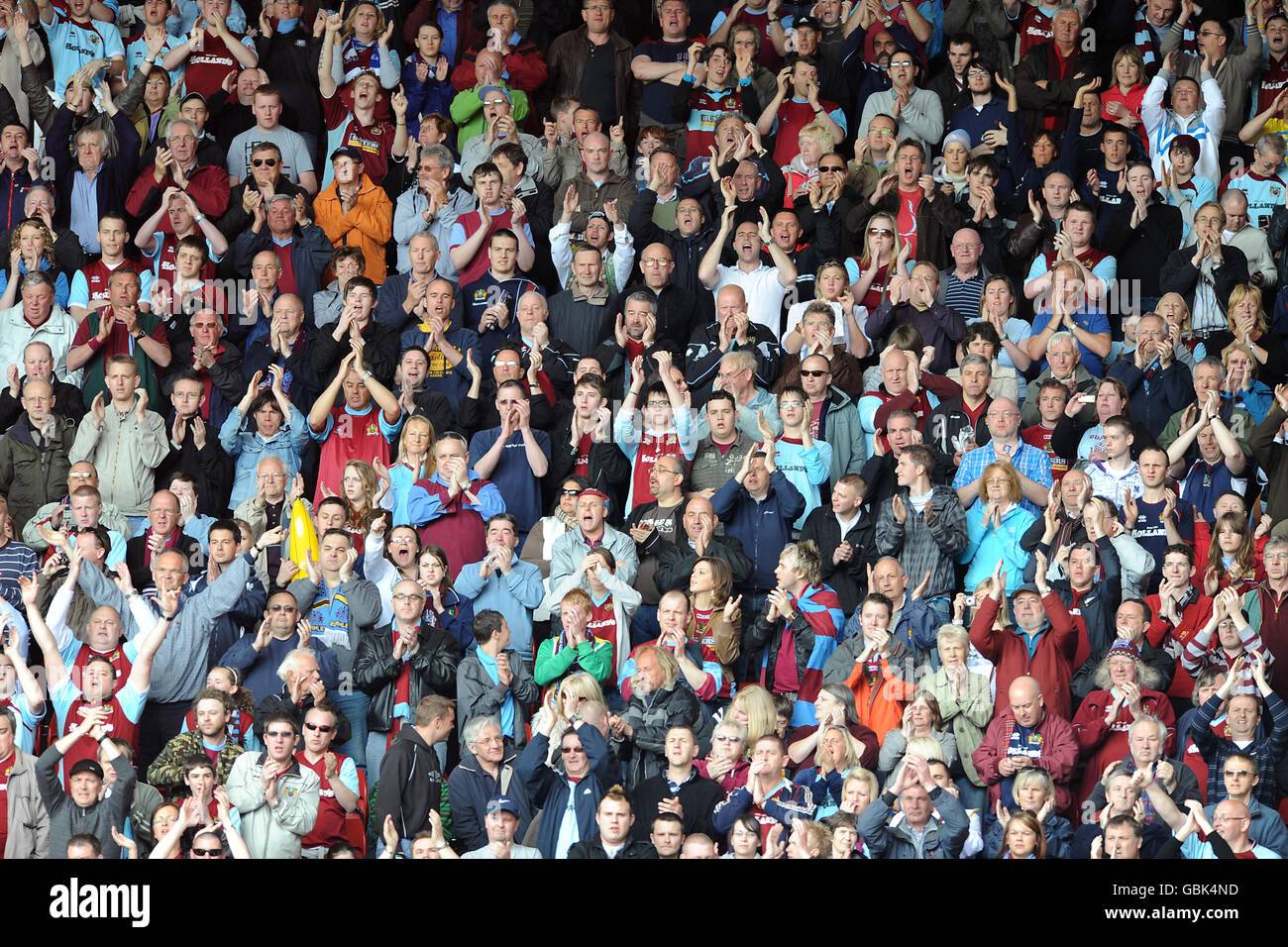 Burnley fans watch the action from the stands hi-res photography and images - Alamy