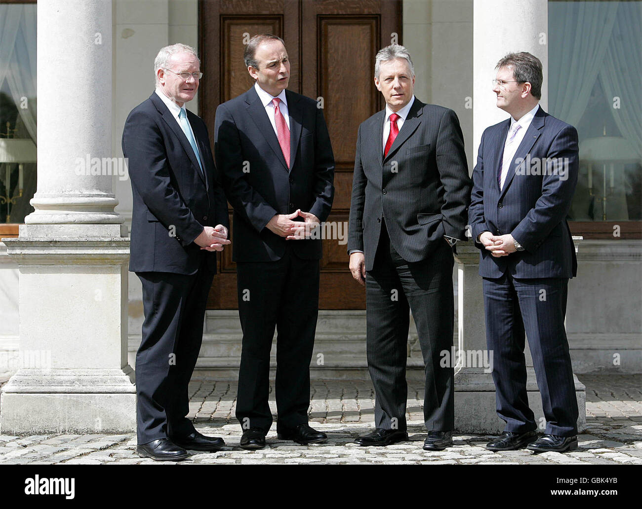 Minister for Foreign Affairs Michael Martin (second left), Northern Ireland First Minister Peter Robinson (second right), Deputy First Minister Martin McGuiness (left) and Jeffrey Donaldson outside Farmleigh House, where they will host a meeting of the North-South Council. Stock Photo
