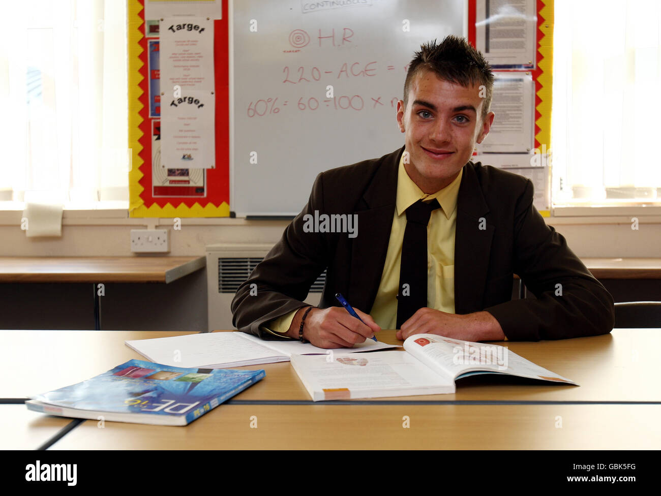 16 year old Richard Peniket poses in a class room at Haybridge High School, Hagley. He has already scored a hat trick for Manchester United Youth team and had just signed a professional contract with Fulham. Wednesday April 29 2009. PA Photo : David Davies. Stock Photo