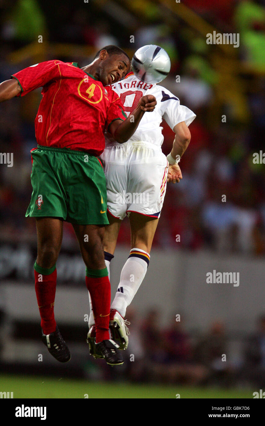 Soccer - UEFA European Championship 2004 - Group A - Spain v Portugal. Portugal's Jorge Andrade wins a header Stock Photo