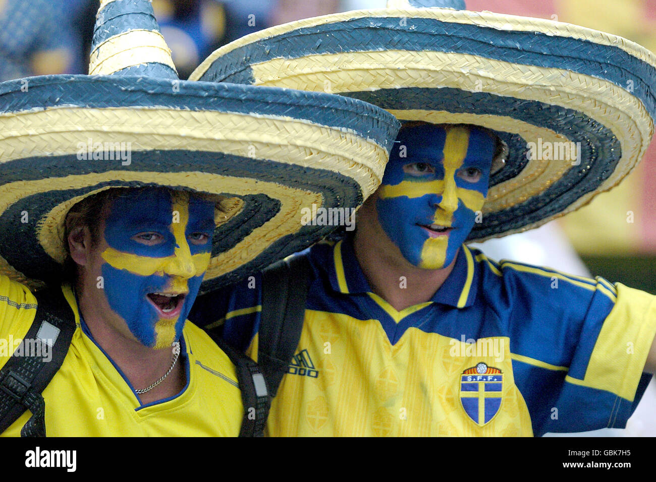 Sweden Fans Sweden fans in team colours hi-res stock photography and images - Alamy