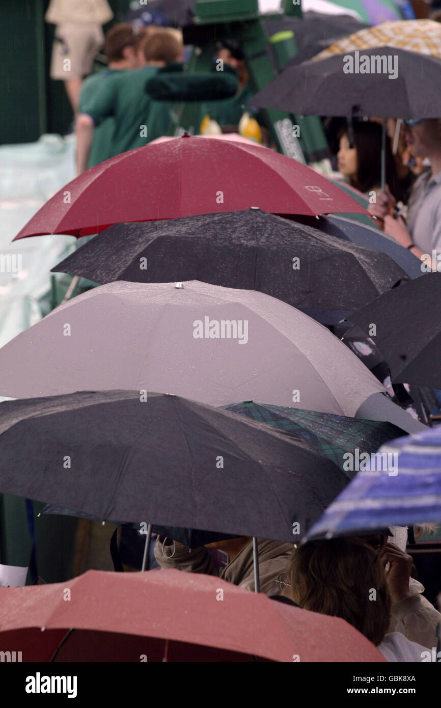 Tennis Wimbledon 2004 First Round. Umbrella's are used at Wimbledon