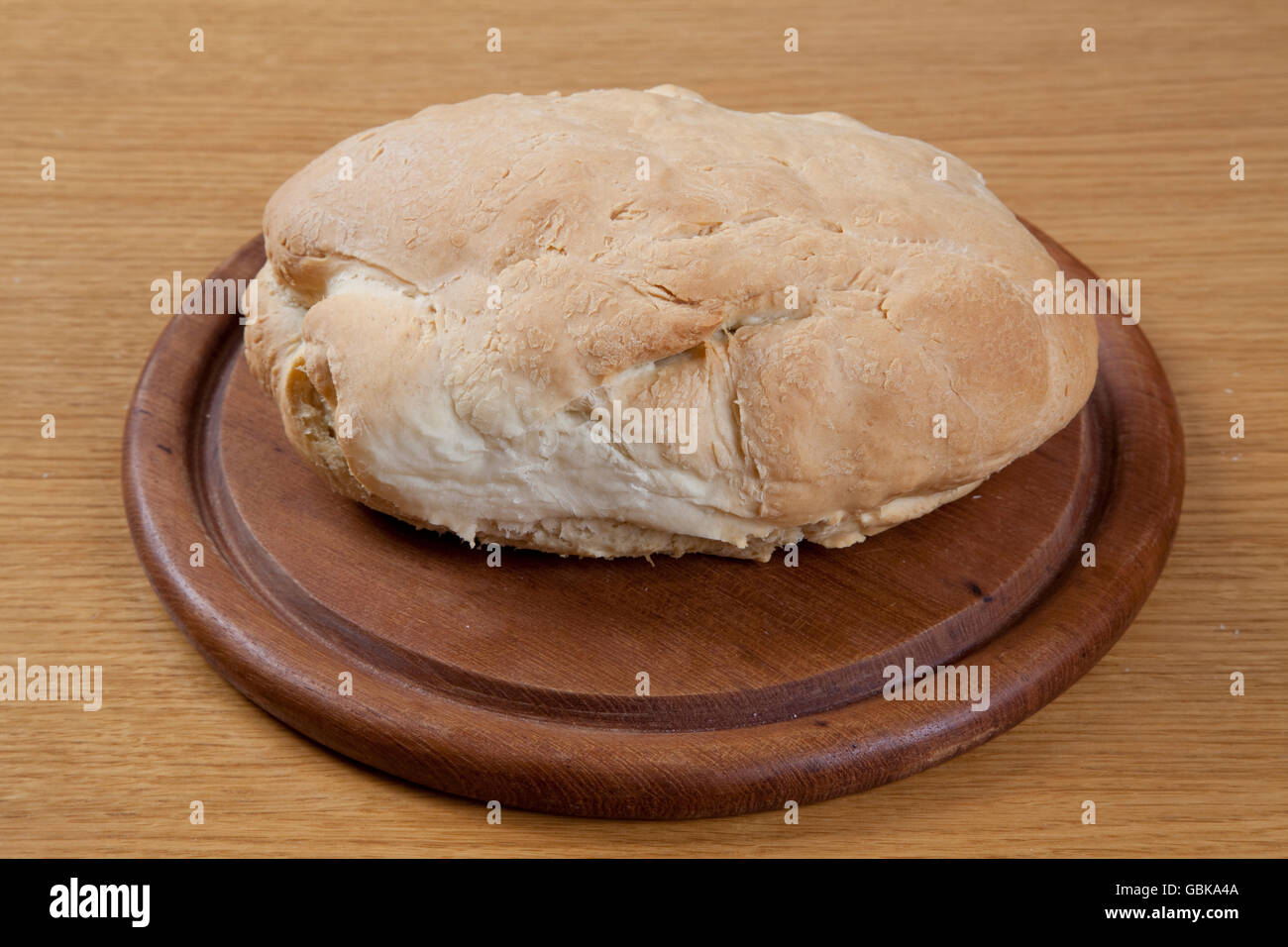 Bread, white bread on a wooden board Stock Photo