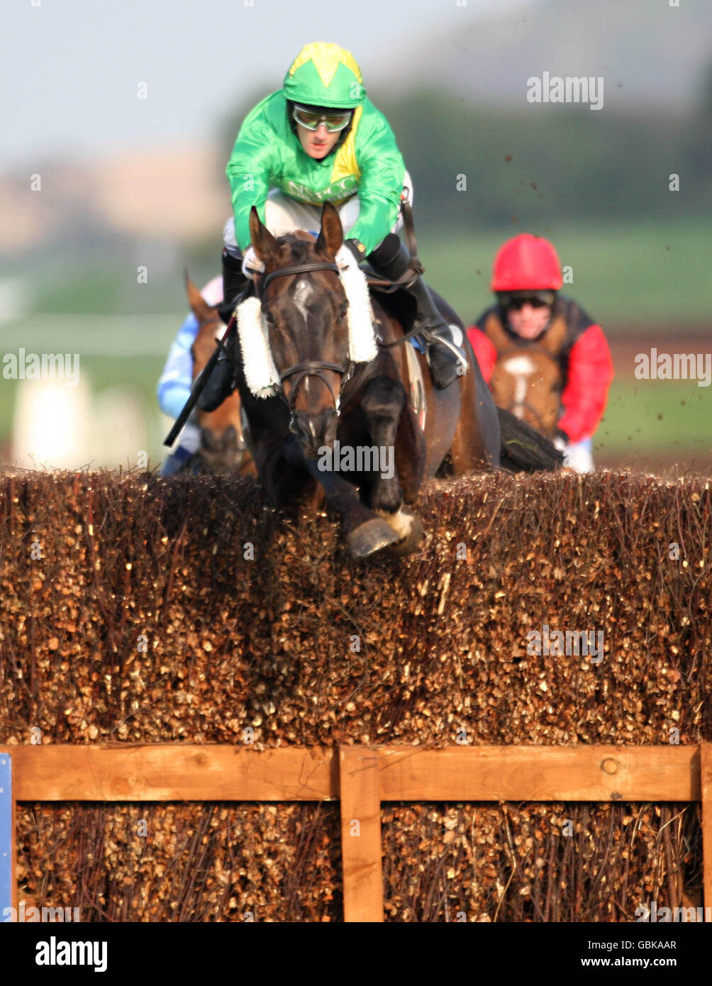 Rathowen ridden by Wilson Renwick (centre) in the Opin Systems Claiming Chase during Day One of the Coral Scottish Grand National Festival at Ayr Racecourse, Ayr. Stock Photo