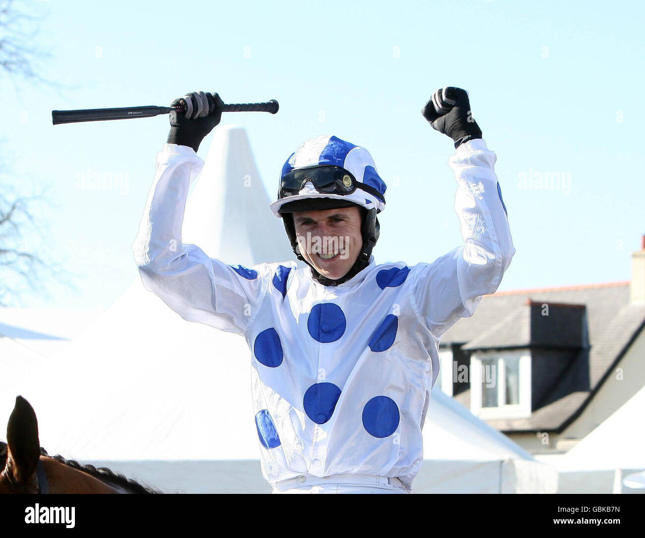 Paddy Brennan celebrates winning the Coral Scottish Grand National on Hello Bud during Day Two of the Coral Scottish Grand National Festival at Ayr Racecourse, Ayr. Stock Photo