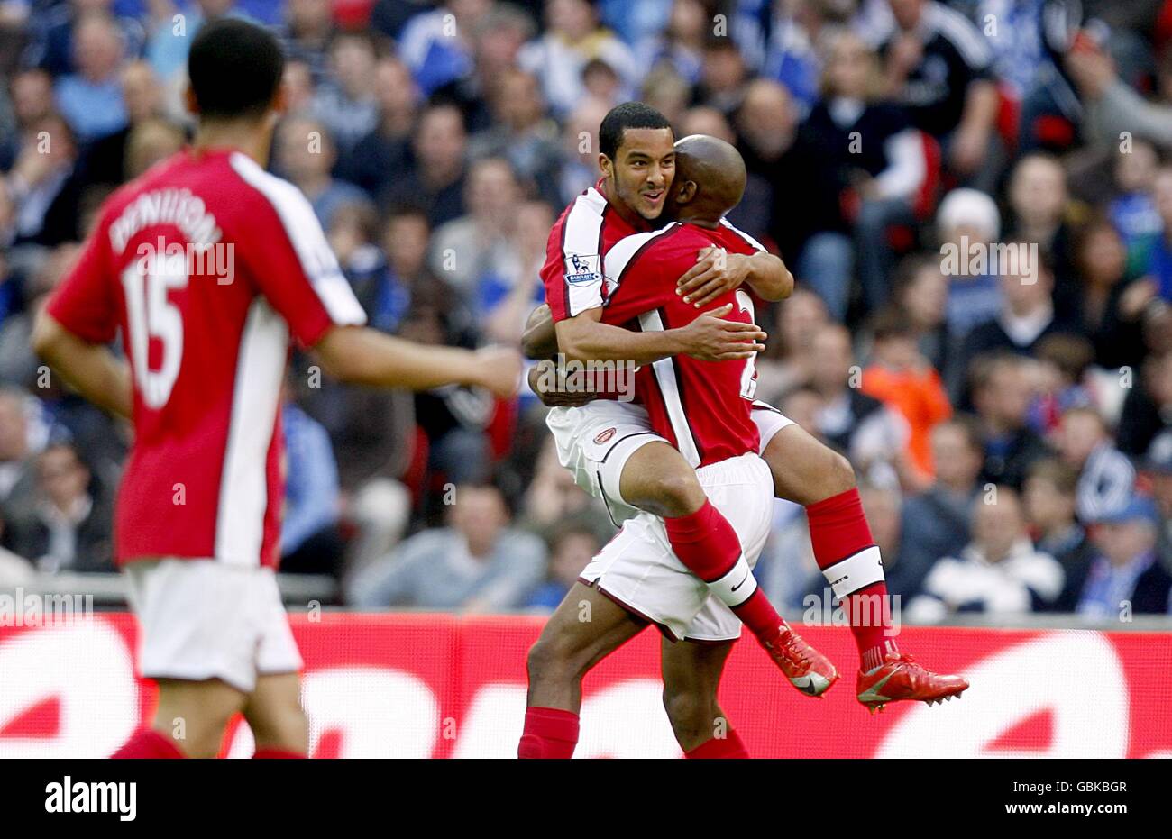 Arsenals theo walcott centre celebrates scoring the opening goal hi-res