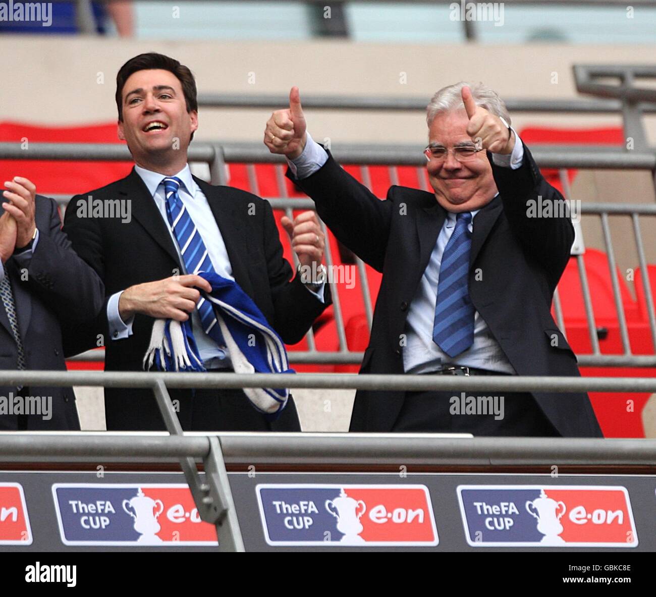Soccer - FA Cup - Semi Final - Manchester United v Everton - Wembley Stadium. Everton chairman Bill Kenwright (right) celebrates victory in the stands with Culture Secretary Andy Burnham (left) Stock Photo
