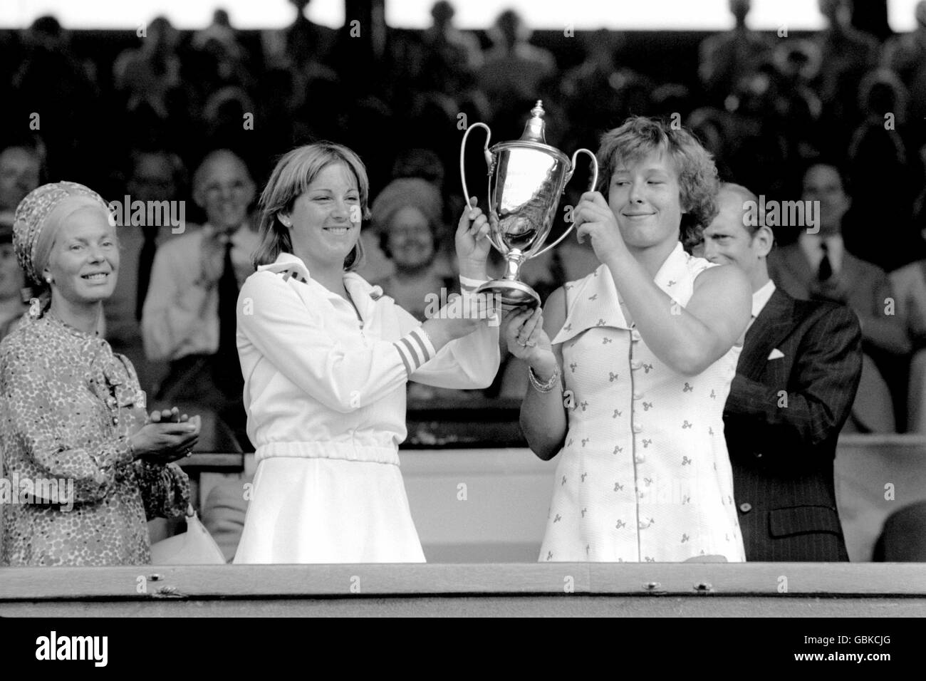 Chris Evert (l) and Martina Navratilova (r) hold the ladies' doubles trophy aloft after beating Billie Jean King and Betty Stove in the final Stock Photo