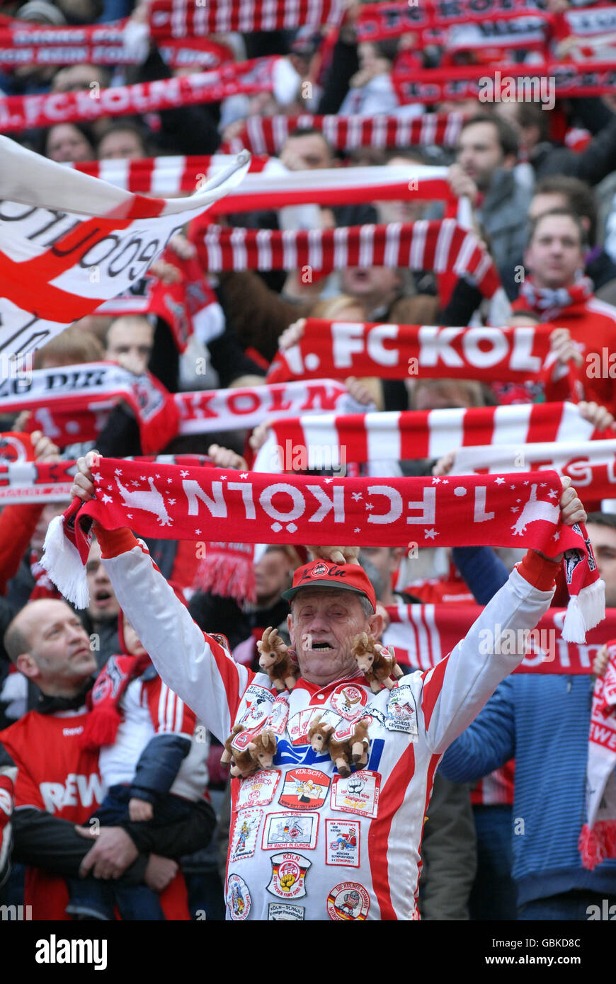Cologne fans holding up their scarves, Bundesliga federal league, 1. FC Koeln - FSV Mainz 05 4:2, Rhein-Energie-Stadion, Cologne Stock Photo