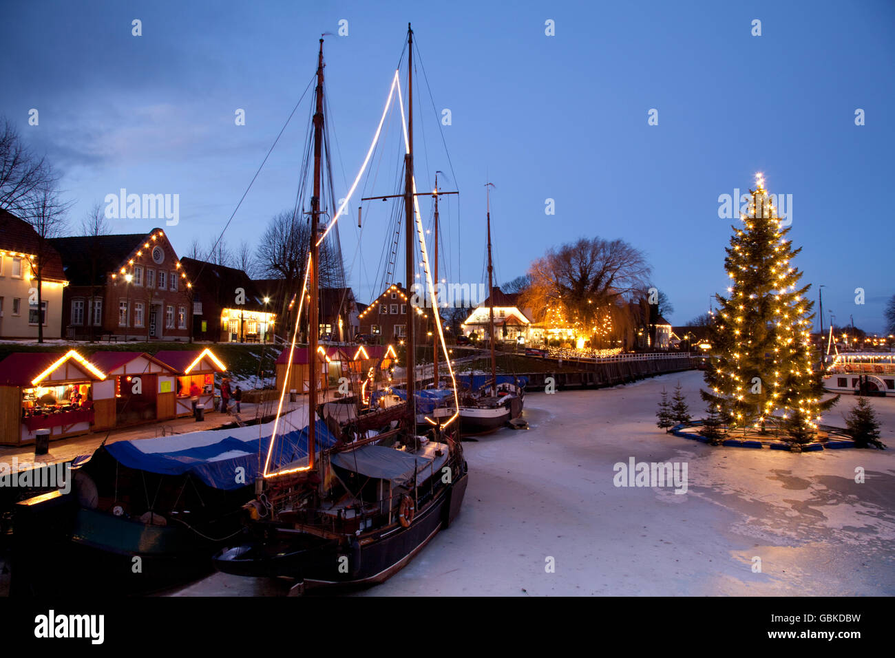 Museumshafen, museum harbour, with Christmas lights, North Sea resort of Carolinensiel, Wittmund region, North Sea, East Frisia Stock Photo