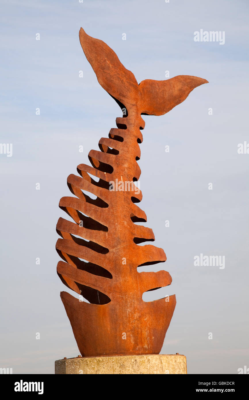 Fish skeleton sculpture at the port, Greetsiel, Krummhoern, East Frisia, Lower Saxony, North Sea Stock Photo