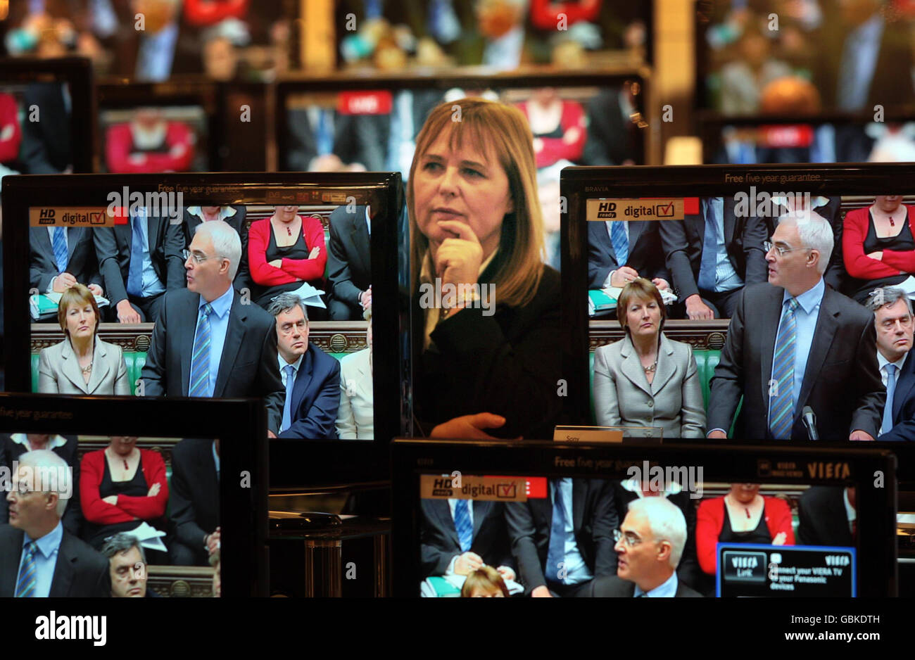 A staff member watches the budget at a branch of John Lewis in Glasgow