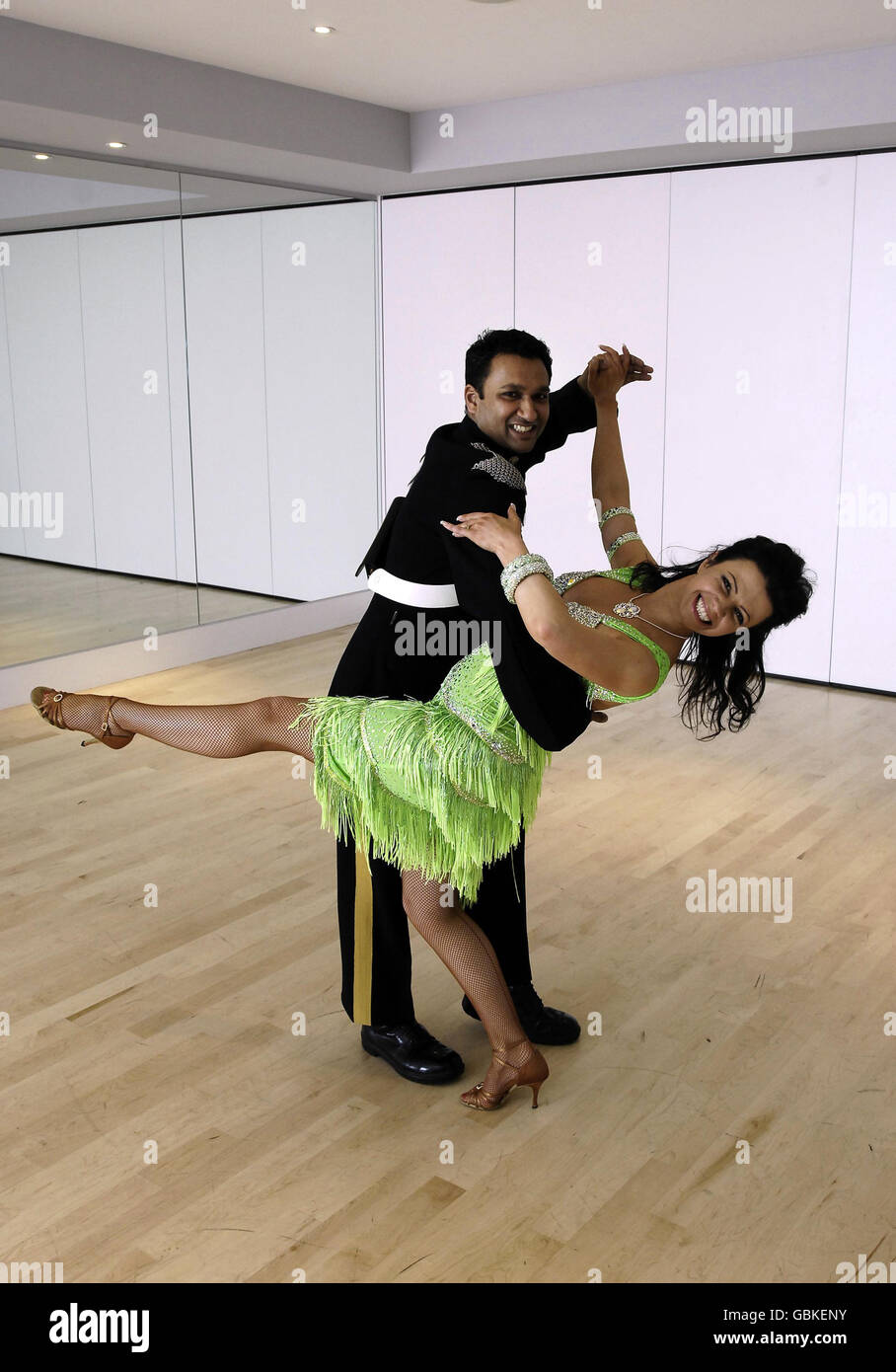 Strictly Come Dancing star Karen Hardy dances with Lance Corporal Ziaur Rahman, of the Royal Yeomanry, at her studios in Chelsea, London, where she is giving dance lesson to school children ahead of a series of Anzac Tea Dances to raise money for the Royal British Legion and to commemorate Anzac Day. Stock Photo