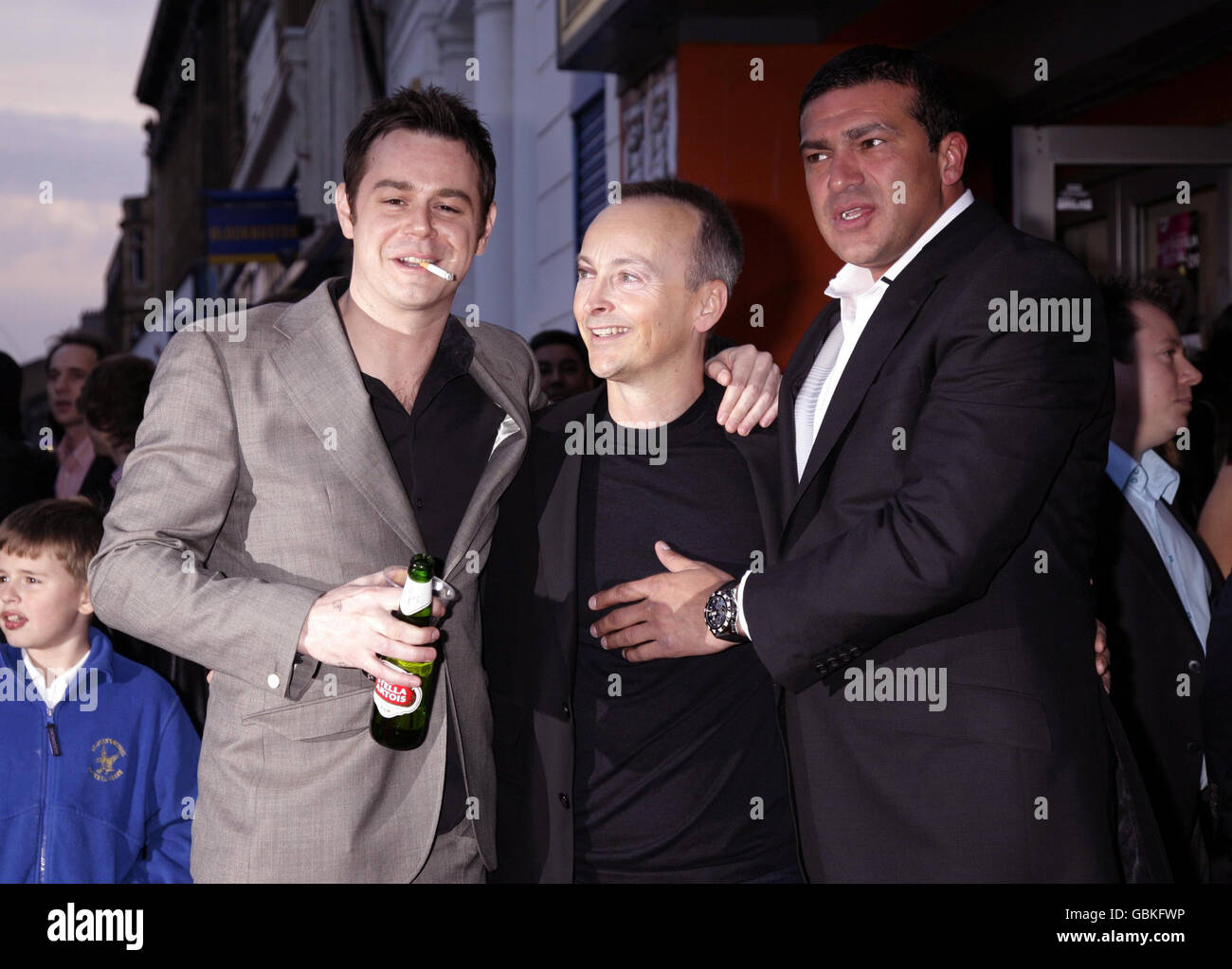 Stars of the film Tamer Hassan (right) and Danny Dyer (left) with the director Steve Kelly, arriving for the premiere of City Rats - during the East London Film Festival - at the Genesis cinema in east London. Stock Photo