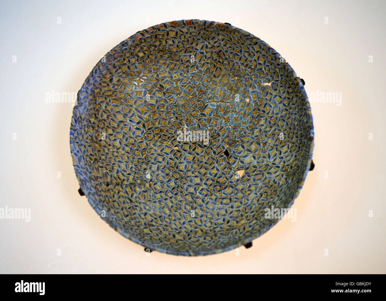 A rare Roman millefiori dish on display at the Museum of London, after it was unearthed from the grave of a wealthy Londoner. It is thought to be the first find of its kind in the western Roman empire. Stock Photo