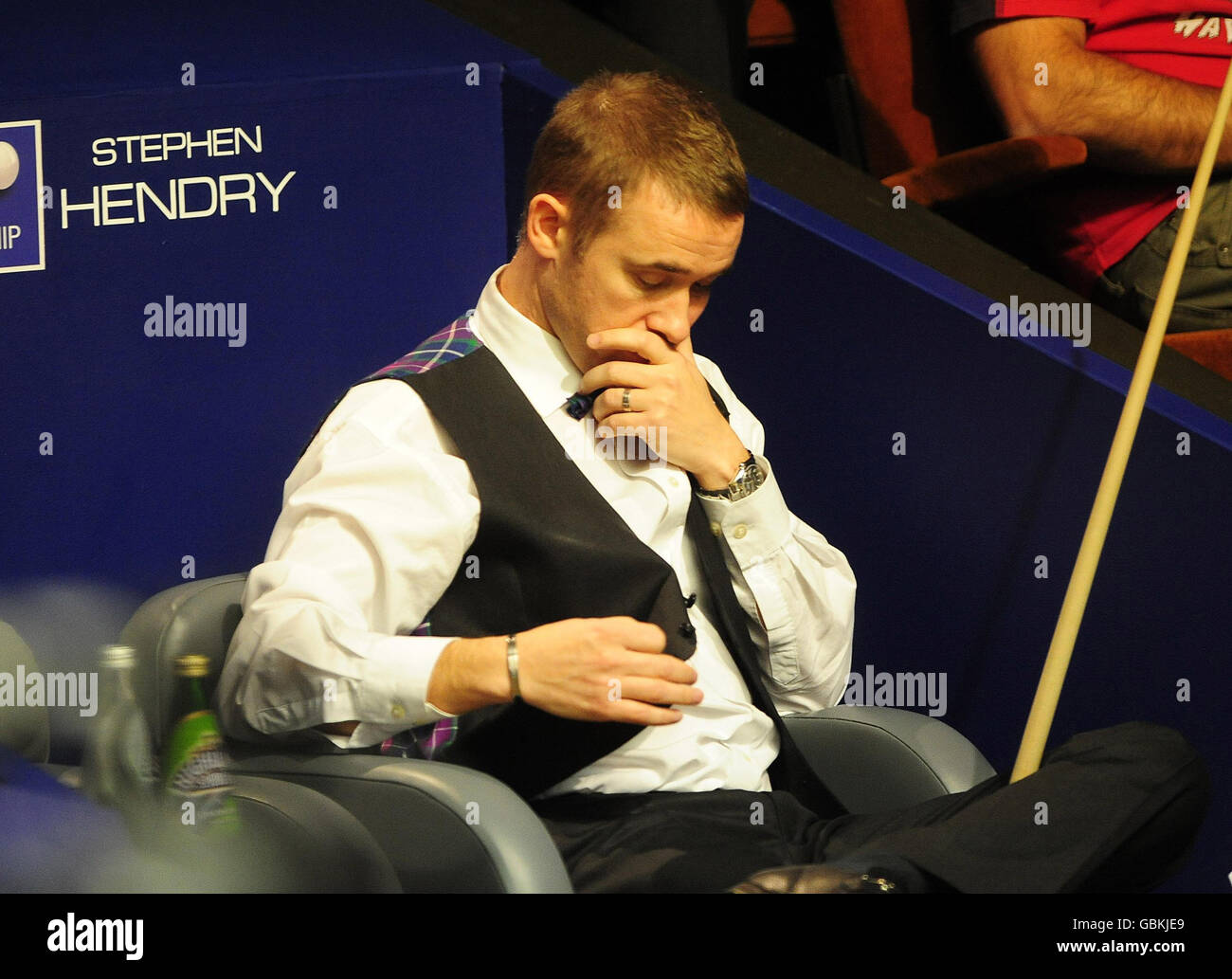 Stephen Hendry sits dejected after losing to Shaun Murphy during the