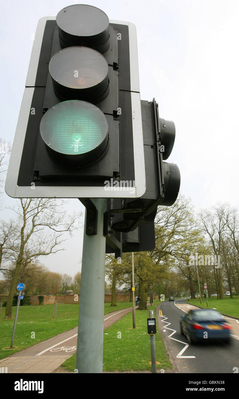 General view of a set of traffic lights on Green. Motorists could face fewer red lights following a change of direction by the Government. Stock Photo