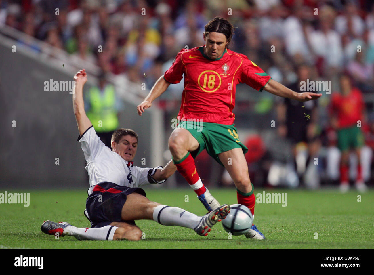 England's Steven Gerrard and Portugal's Maniche battle for the ball Stock Photo