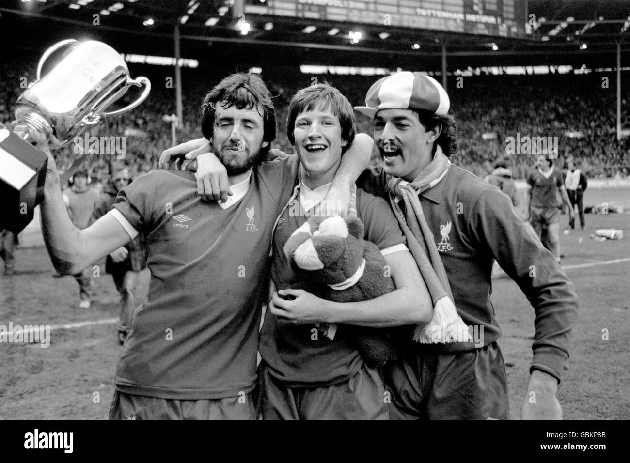 Ronnie whelan and bruce grobbelaar celebrate winning the milk cup Black