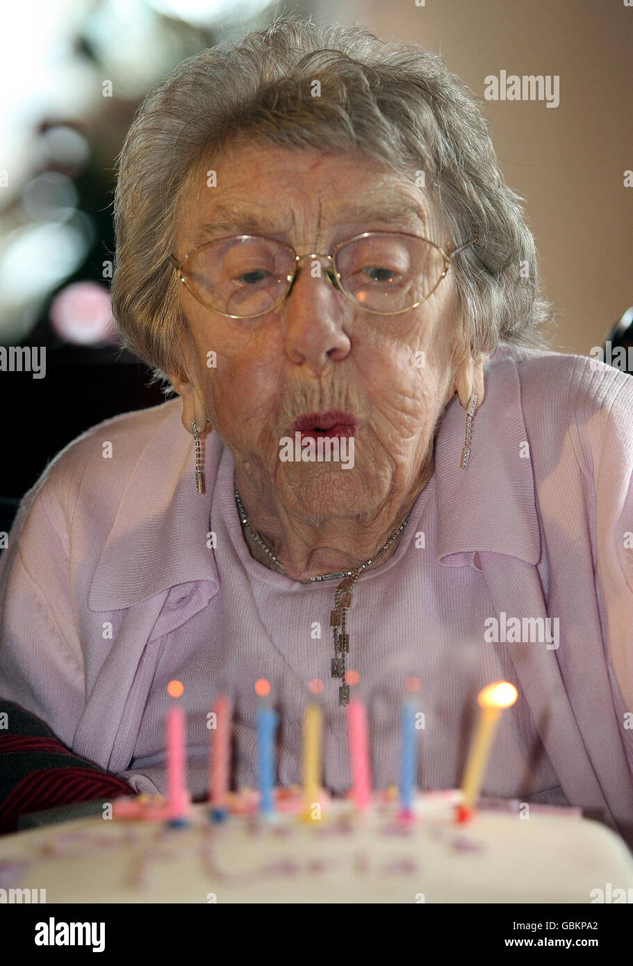 Maria McQuillan, who is 107-years-old today, celebrates her birthday at the City Way Day Centre in south Belfast. Stock Photo