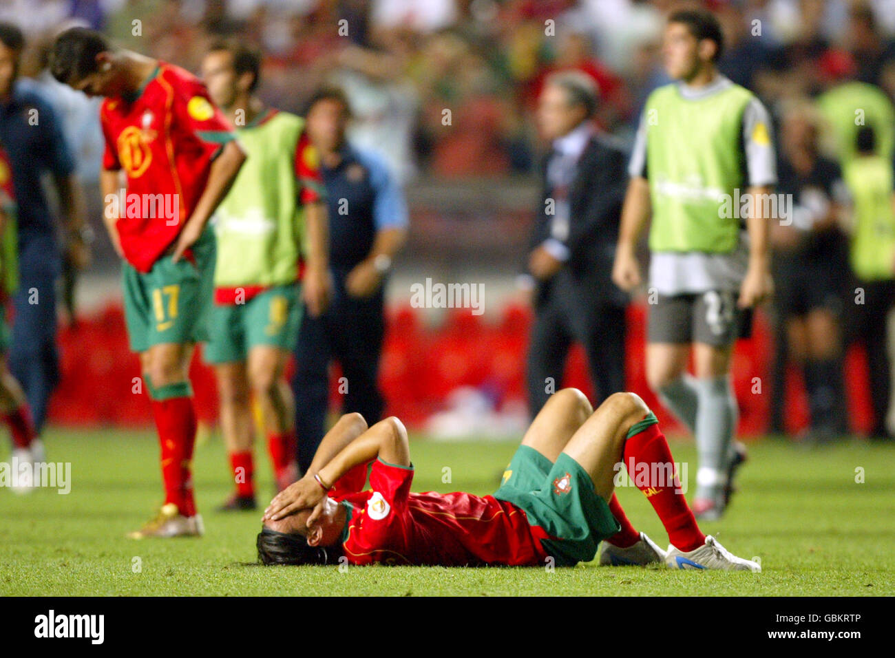 Soccer - UEFA European Championship 2004 - Final - Portugal v Greece. Portugal's Nuno Gomes lies dejected Stock Photo
