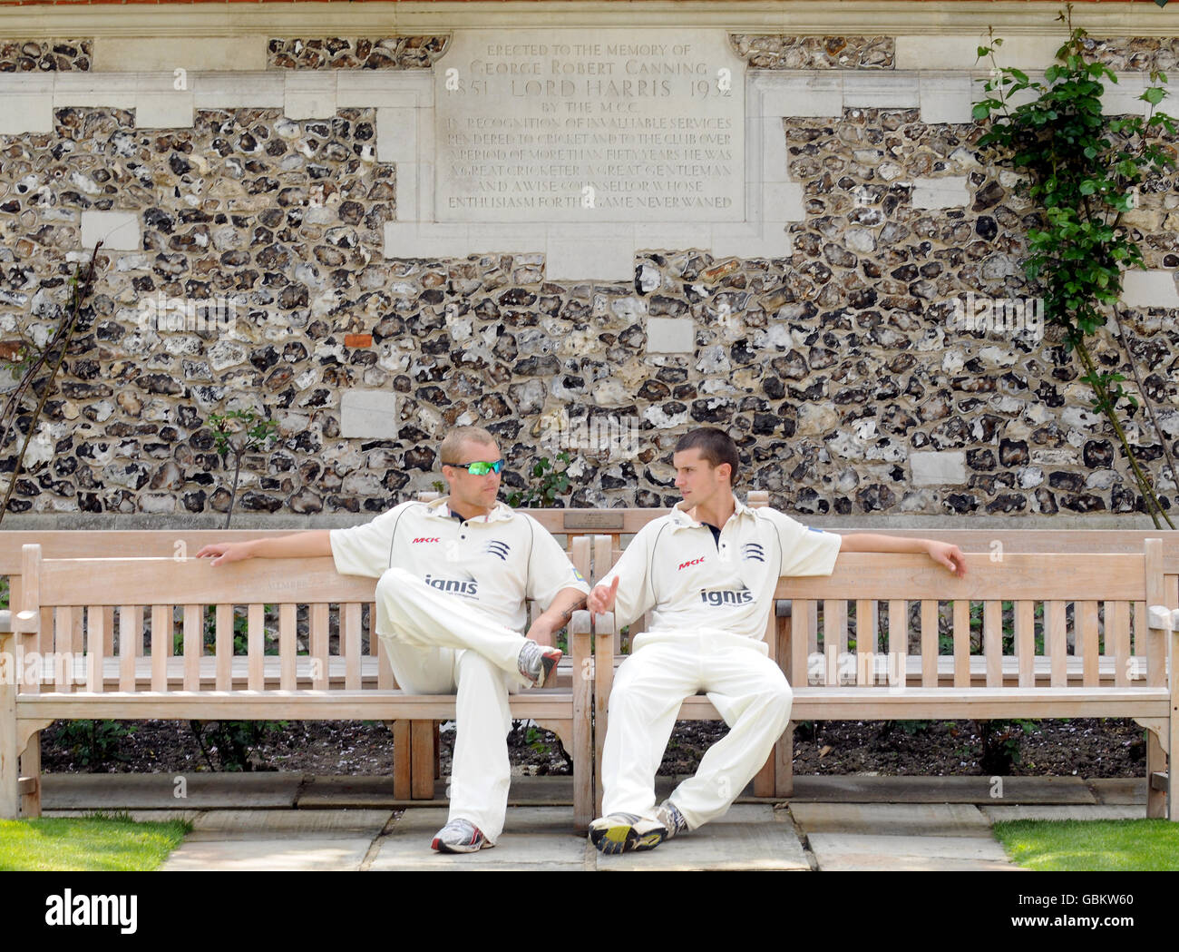 Middlesex players Gareth Berg (left) and Dan Housego rest on a bench in the  Harris Garden before a pre-season photocall at Lord's Cricket Ground,  London Stock Photo - Alamy
