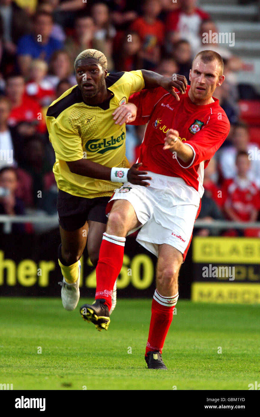 Wrexham's Danny Williams (r) and Liverpool's Djibril Cisse (l) battle for the ball Stock Photo