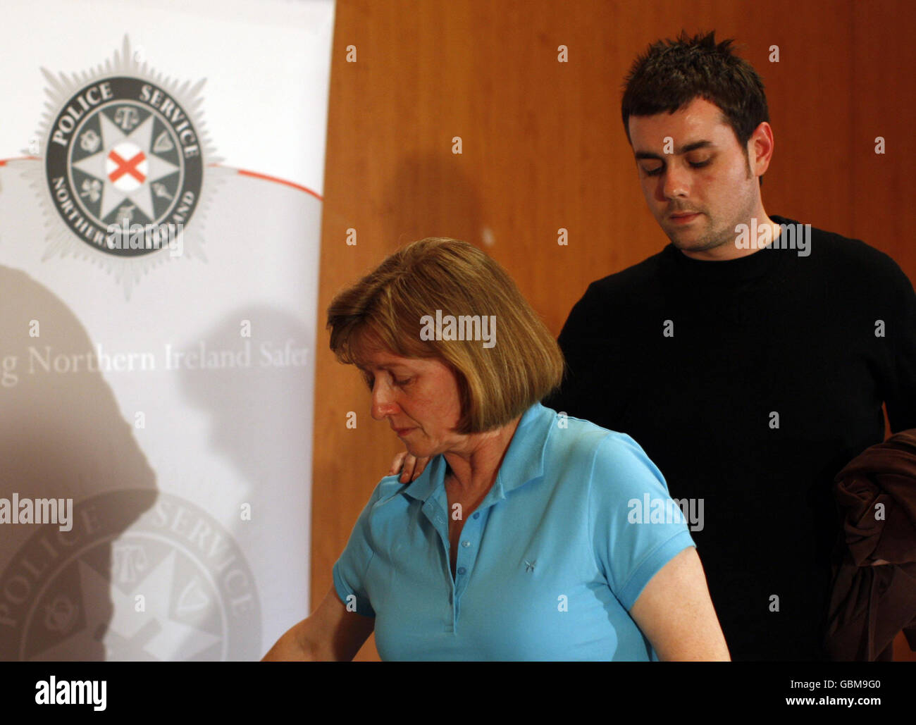 The wife of Geoff Kerr, Sally Kerr and his son, Richard Kerr, at a press conference to appeal for information regarding Mr. Kerr's death, in Templepatrick, Northern Ireland. Stock Photo